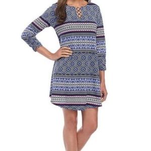 New DirectionsThree-Quarter Sleeve Grommet Neck